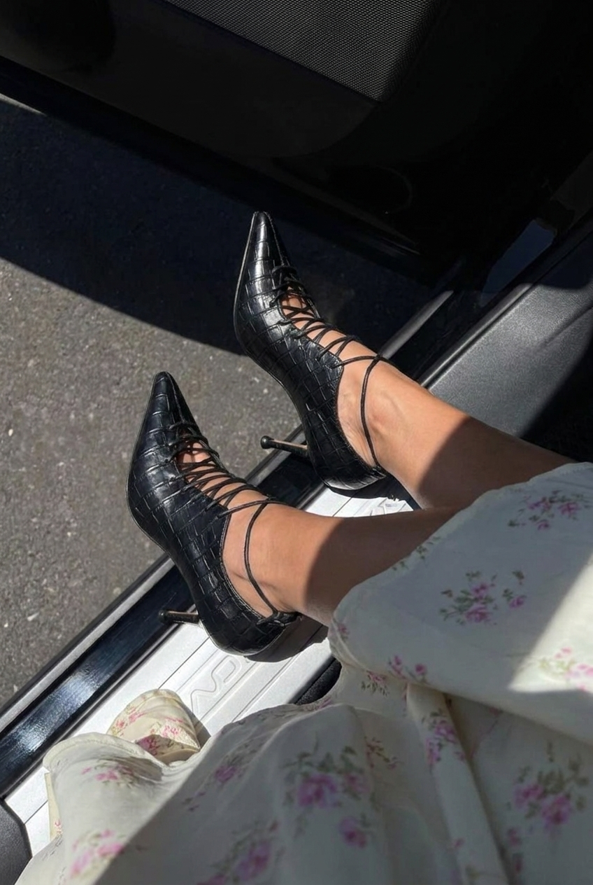 Leather boots with croc imitation heels