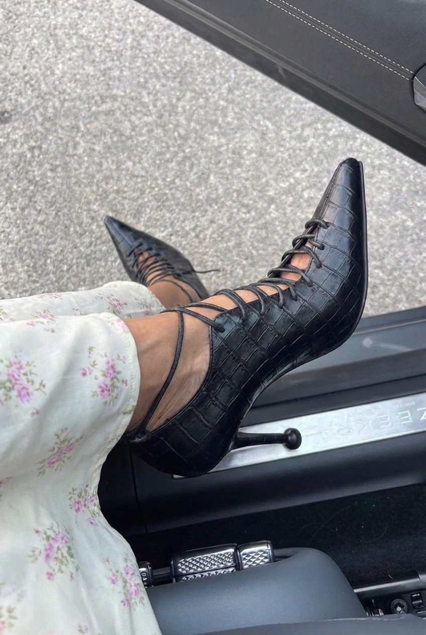 Leather boots with croc imitation heels